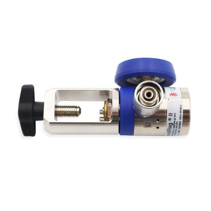 Comweld MediReg II nitrous oxide N2O pin index regulator top view showing blue outlet cap SIS port and brass pin index pins in yoke