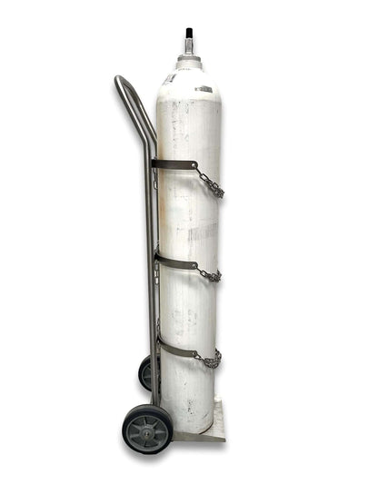 Medical gas cylinder trolley E and G size side view with G-size cylinder loaded showing curved handle, three chain securing points and stainless steel base plate