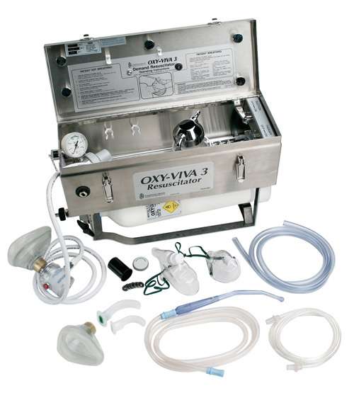 Comweld Oxy-Viva 3 resuscitator kit open stainless steel case showing demand valve, suction canister, pressure gauge and full kit contents