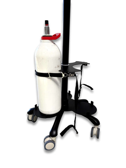 Tri cylinder trolley side view with one D-size cylinder secured by black webbing strap showing adjustable chrome post and five-star castor base